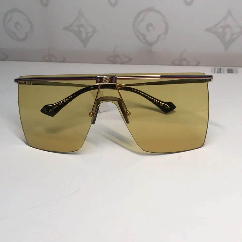 New Authentic GG1096S 003 Sunglasses by Gucci™ Shield, Material: Metal, Rimless.